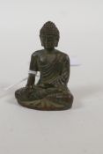A small Sino Tibetan bronze Buddha, 2" high