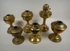 Six brass oil lamp bases