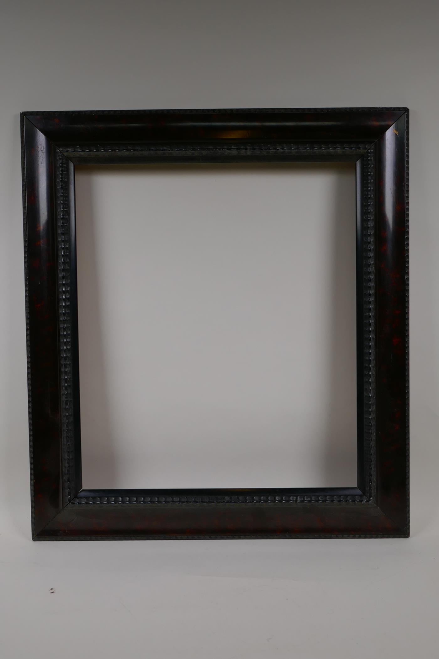 An early C20th Dutch style picture frame, with simulated tortoiseshell and ripple decoration, 18" - Image 4 of 4