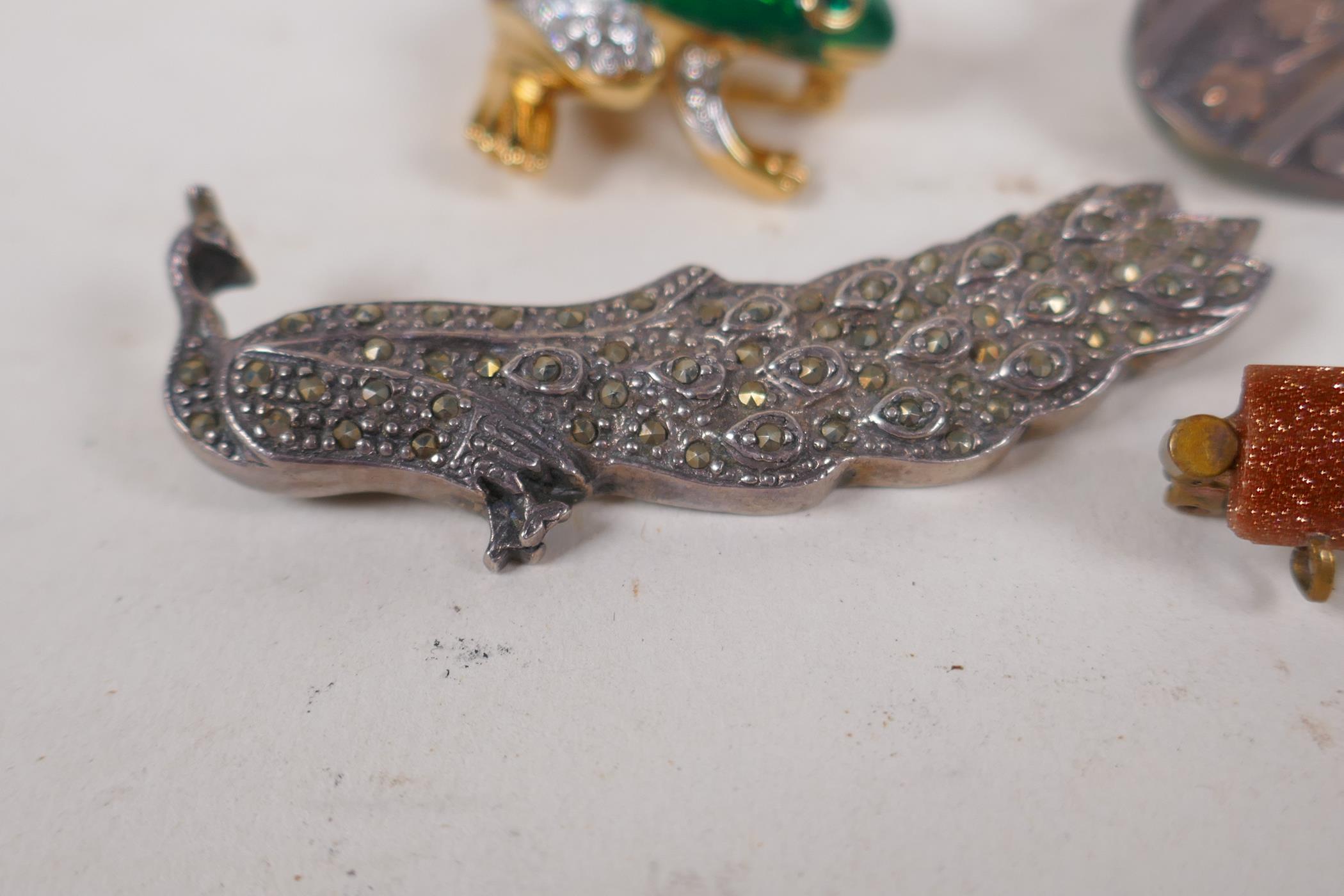 A gilt and enamel frog brooch, and four silver set brooches including goldstone, marcasite etc - Image 5 of 5