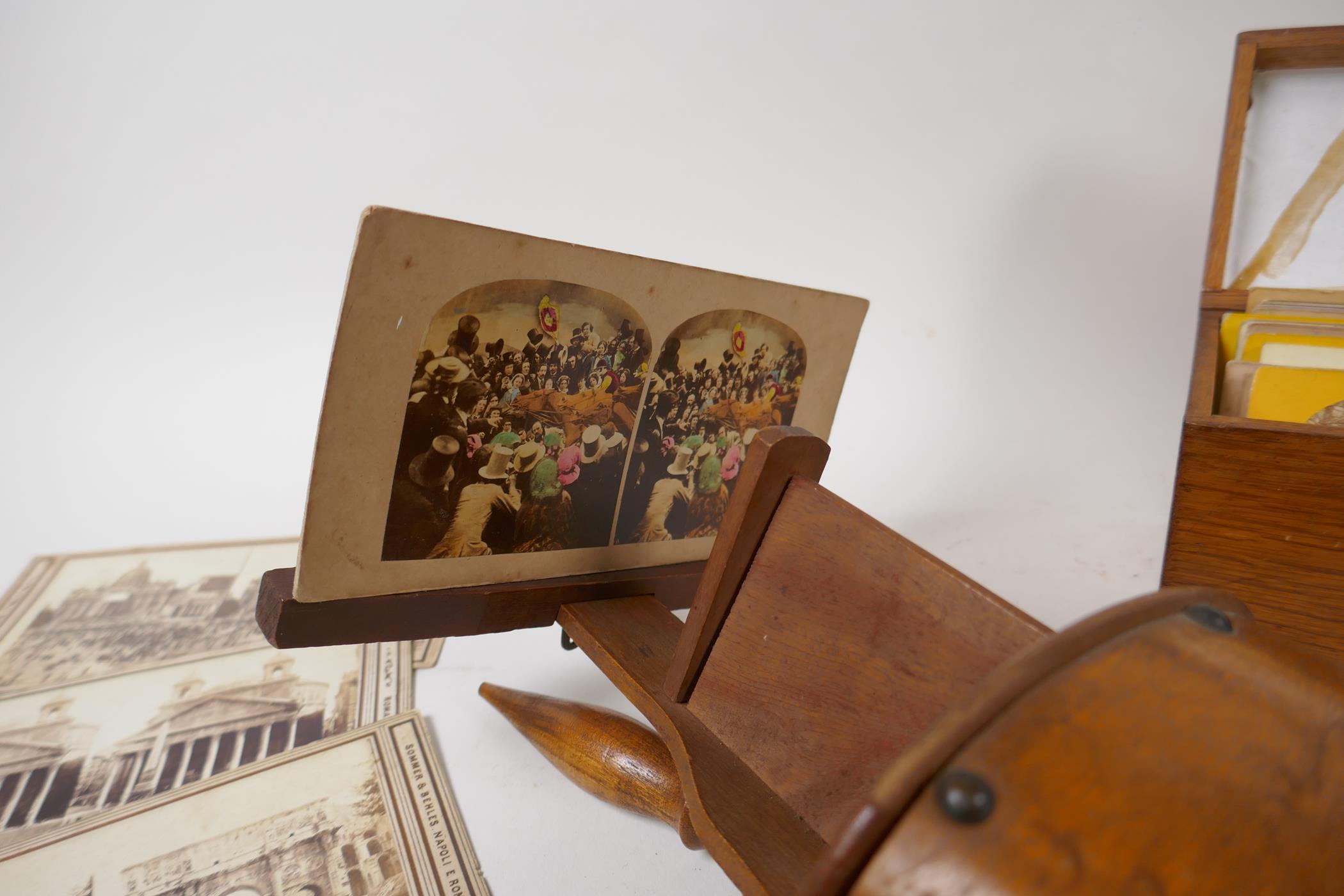 An early C20th stereoscopic viewer, and a boxed collection of viewer cards depicting various - Image 3 of 6