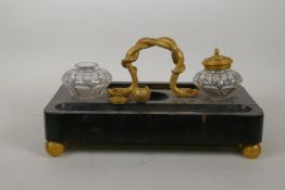 C19th ebonised desk stand with ormolu handle in the form of a serpent, AF losses, 35 x 21 x 15cm