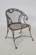 A child's wrought iron garden chair, 52cm high