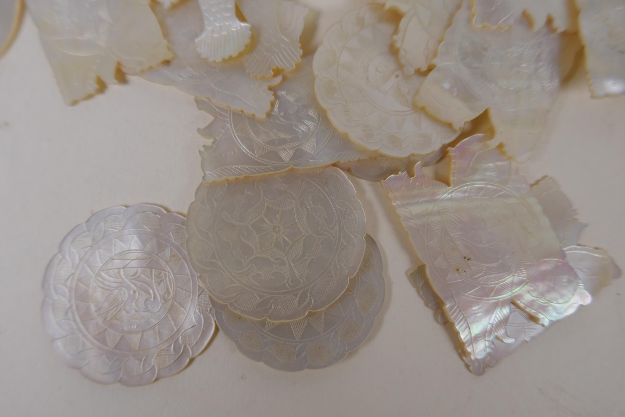 Approximately 100 Chinese carved and engraved mother of pearl gaming chips - Image 3 of 5