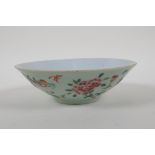 A Chinese famille vert porcelain dish decorated with birds, butterflies and flowers, mark to base,