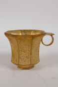 A Chinese gilt metal octagonal shaped libation cup, 4 character mark to base, 6cm high