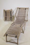 A slat back teak deck chair, and two stools