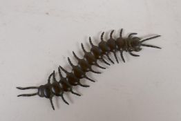 A Japanese Jizai style bronze okimono centipede with articulated body, 15cm long