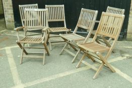 A set of six (4+2) folding garden chairs