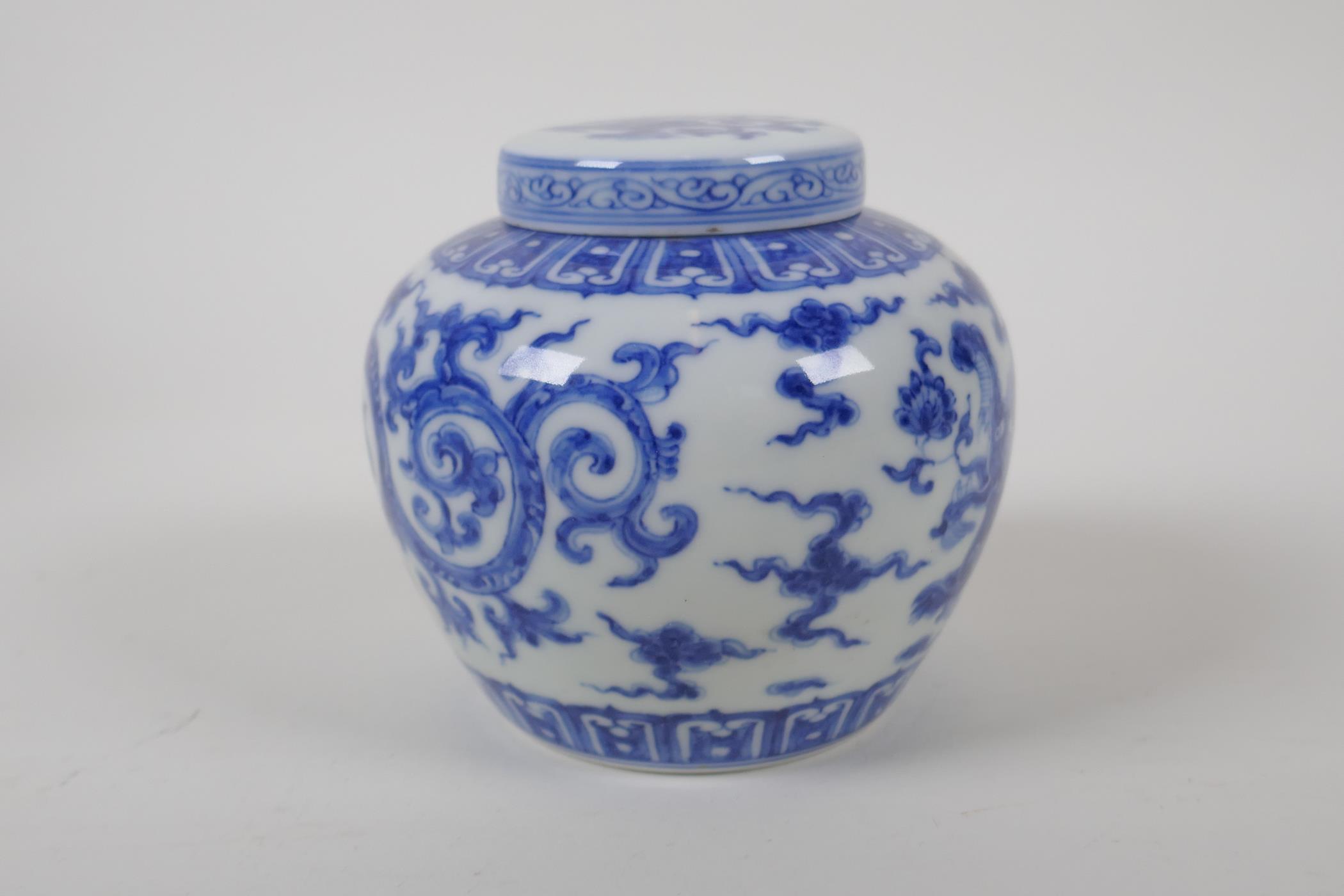 A Chinese blue and white porcelain ginger jar and cover, with scrolling dragon decoration, character - Image 4 of 7