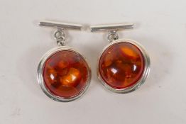 A pair of 925 silver and baltic amber cufflinks