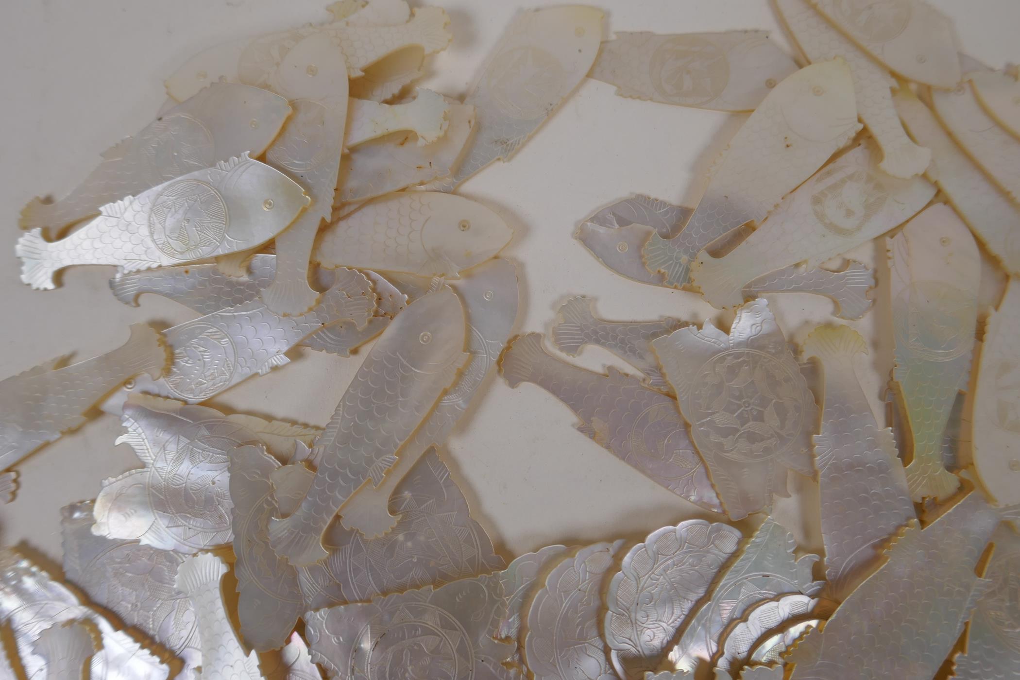 Approximately 100 Chinese carved and engraved mother of pearl gaming chips - Image 5 of 5