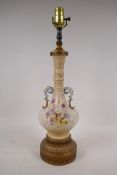 A C19th Worcester style two handled vase, converted to a lamp, with pierced brass base and mounts,