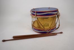 A vintage military brass bandsman's drum with Royal crest, 23cm diameter, 18cm high