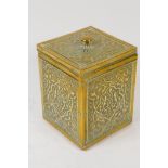 A Chinese embossed brass cased square section tea caddy with metal liner, 10.5cm square