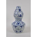 A Chinese blue and white porcelain double gourd vase with character decoration, 4 character mark