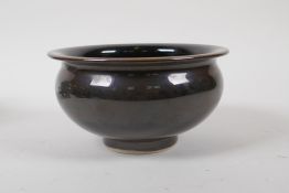 A treacle glazed porcelain bowl, Chinese Tianqi 6 character mark to base, 14cm diameter