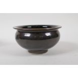 A treacle glazed porcelain bowl, Chinese Tianqi 6 character mark to base, 14cm diameter