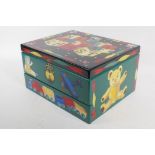 A small painted wood nursery chest the base drawer with music box movement, 30 x 24 x 16cm