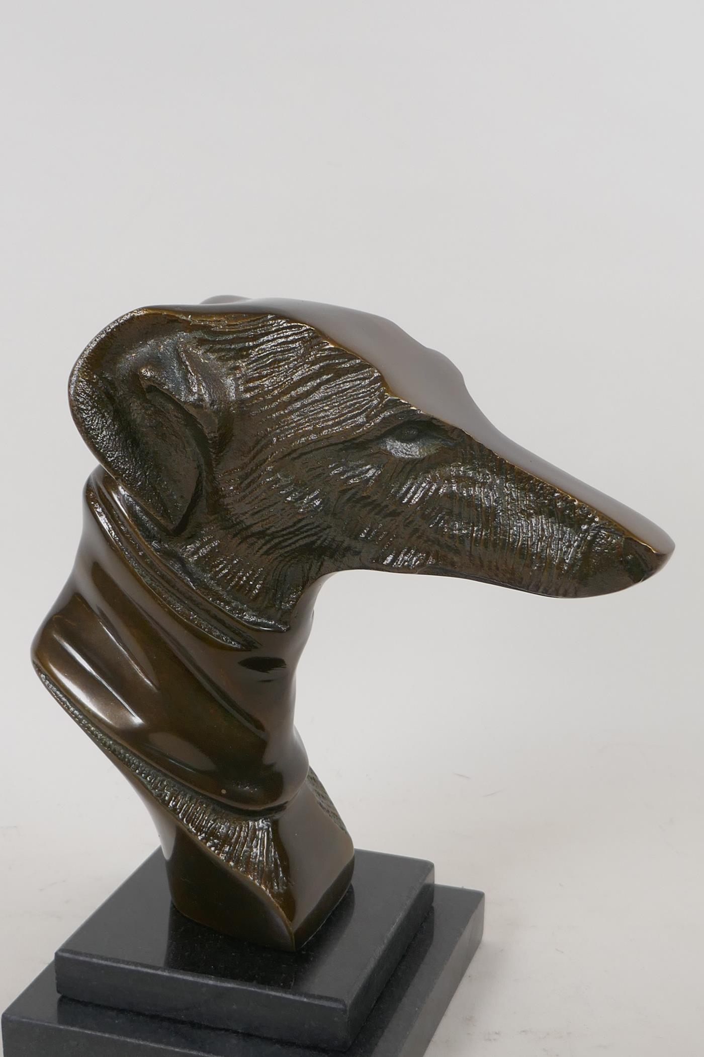 A stylised head bust of a greyhound mounted on a stepped marble base, 23cm high - Image 2 of 3