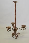 A gilded wrought iron three branch pendant ceiling lamp, 79cm long