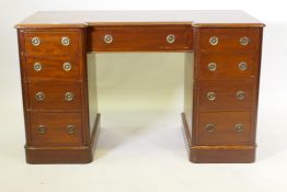 Early C19th mahogany inverted breakfront kneehole desk comprising nine drawers with brass ring