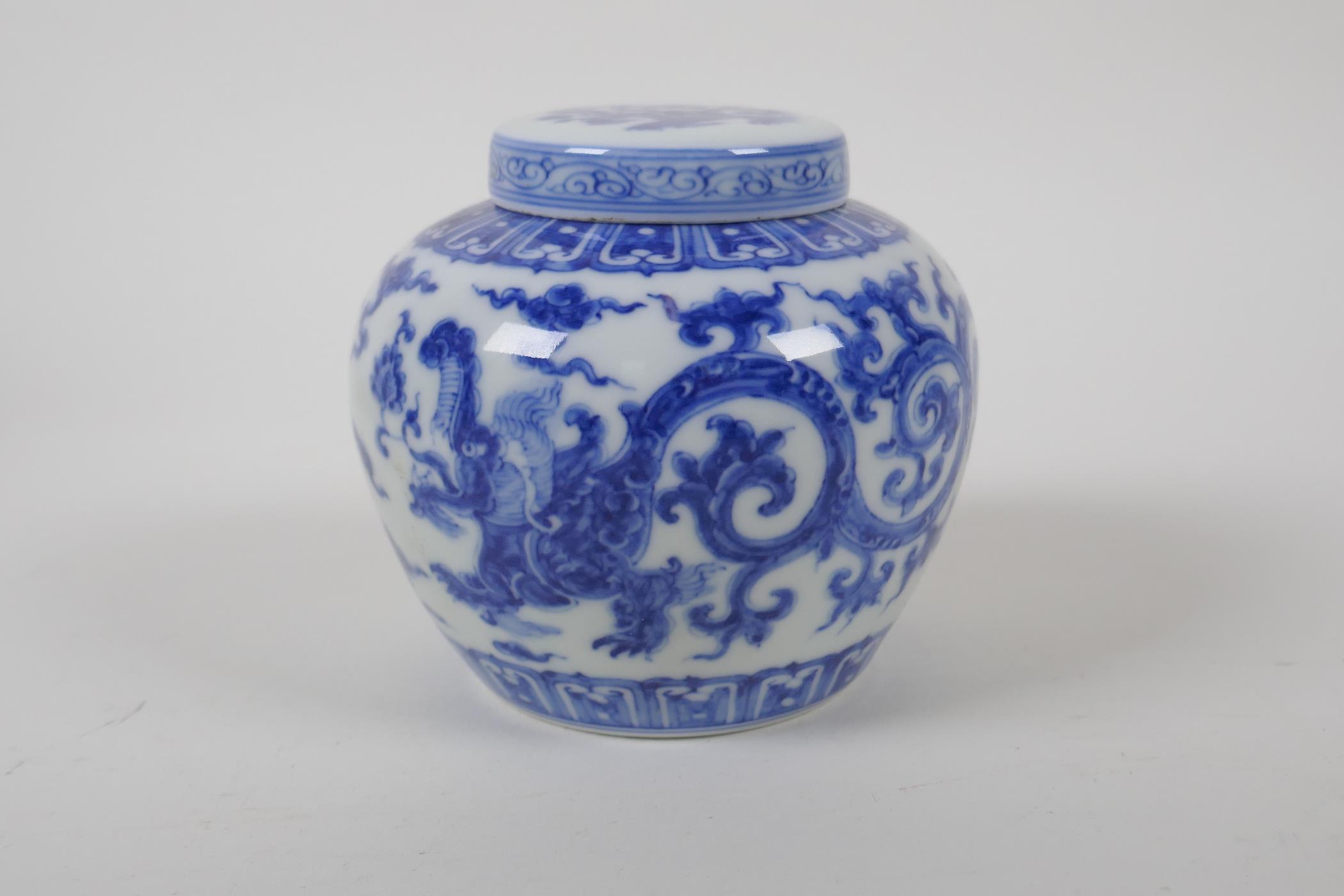 A Chinese blue and white porcelain ginger jar and cover, with scrolling dragon decoration, character - Image 3 of 7