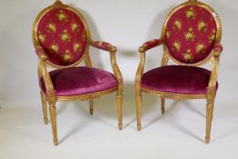 A pair of giltwood Louis XV style armchairs, 112cm high