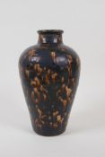 A Chinese cizhou kiln meiping vase with tortoiseshell style glaze, 19cm high