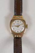 A vintage 9ct gold cased Mira 15 jewels Incabloc cocktail watch, marked to interior
