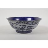 A powder blue glazed porcelain bowl with white enamel dragon decoration, Chinese Chenghua 6