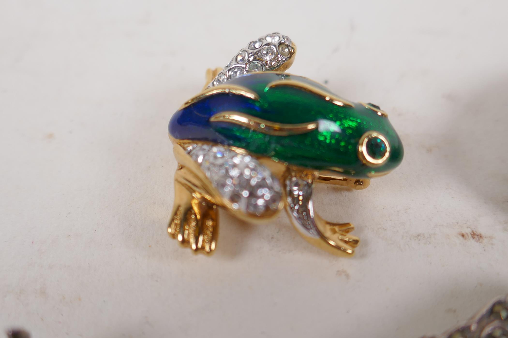 A gilt and enamel frog brooch, and four silver set brooches including goldstone, marcasite etc - Image 4 of 5