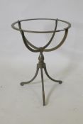 A painted iron stand, 60cm high, 46cm diameter