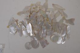 Approximately 100 Chinese carved and engraved mother of pearl gaming chips