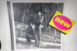 A promotional poster for Prince's album 'Come' mounted on card, 100cm x 76cm