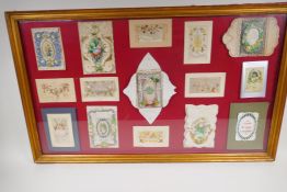 A framed collection of fifteen late C19th/early C20th greetings cards