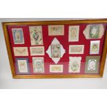 A framed collection of fifteen late C19th/early C20th greetings cards