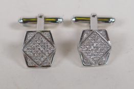 A pair of 925 silver and cubic zirconia cuff links