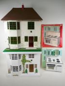 A vintage Triang dolls' house, 53cm high, 46cm wide, a scratch built dolls' house and a Cucina LAC