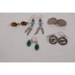 Five pairs of silver earrings including a pair crafted from New Zealand 1948 silver sixpences