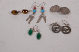 Five pairs of silver earrings including a pair crafted from New Zealand 1948 silver sixpences