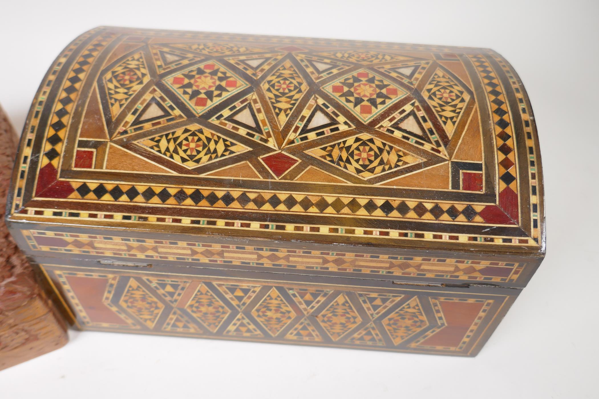 A Damascan inlaid dome top wooden jewellery box, 27cm long, and an extensively carved oriental - Image 2 of 4