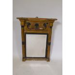 A Regency giltwood pier glass with anthemion decoration, bevelled mirror and reeded ebonised slip,
