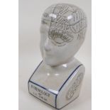 A porcelain phrenology head, 11" high