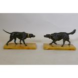 After P.J. Mene, a pair of bronze figures of pointer dogs, mounted on marble bases, unsigned, 20 x