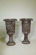 A pair of large openwork iron pedestal garden urns with lattice design, 94cm high, 52cm wide