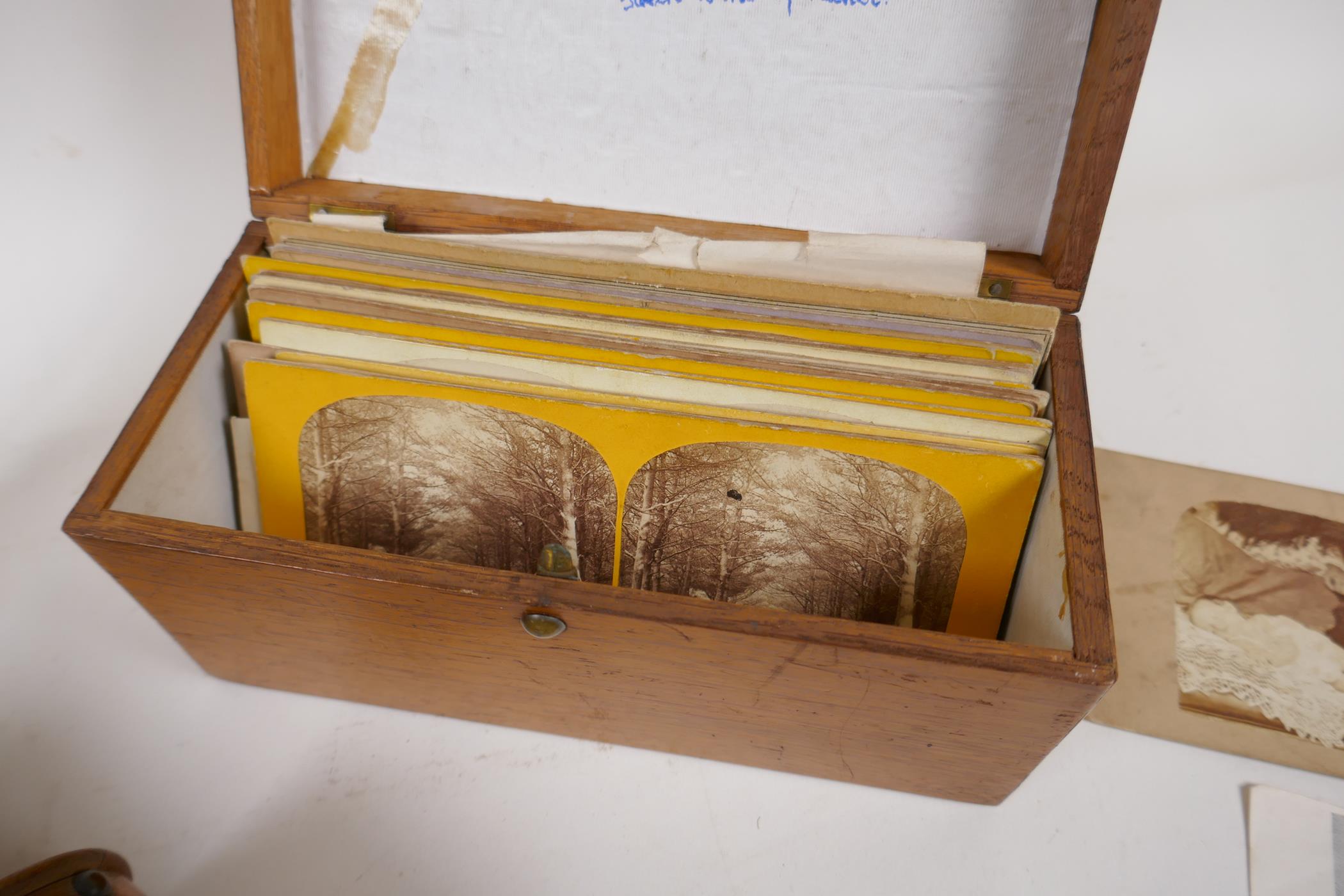 An early C20th stereoscopic viewer, and a boxed collection of viewer cards depicting various - Image 6 of 6