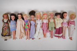 Eleven vintage Sindy dolls from the 70s and 80s, and extensive wardrobe
