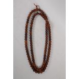 A string of horn mala beads, 150cm long
