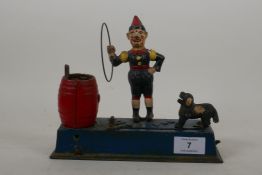 An early C20th American Hubley 'Trick Dog' cold painted cast iron money box, 22 x 18cm